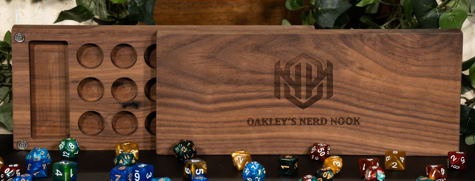 Rectangle-shaped Walnut Wooden Dice Crate. Tons of space for individual dice in circular holes as well as another compartment for dice or mini-figures and more.