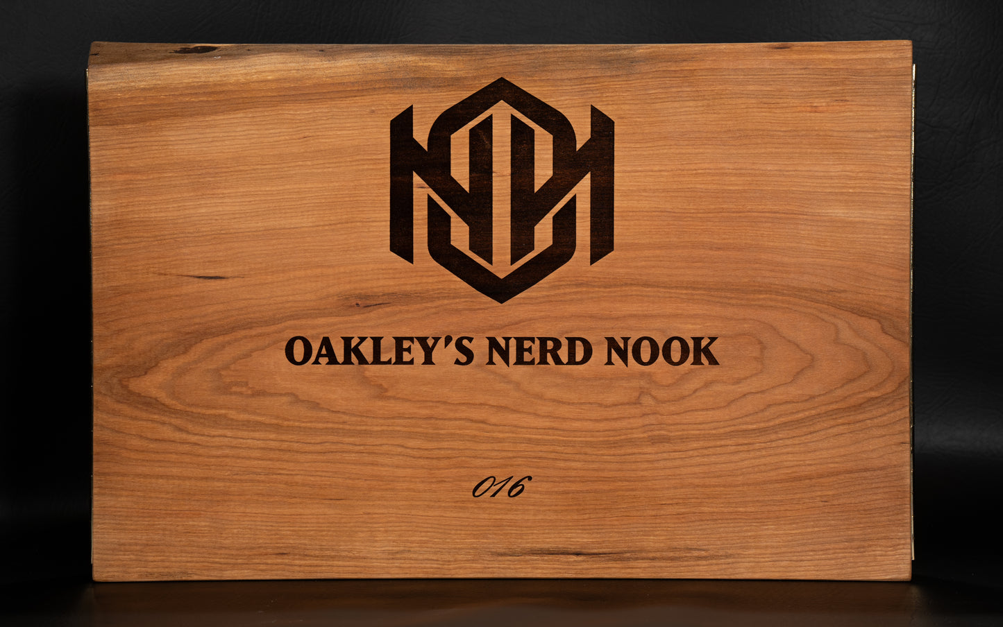 Cherry Wooden Game Master Screen Front with text imprinted "Oakley's Nerd Nook".