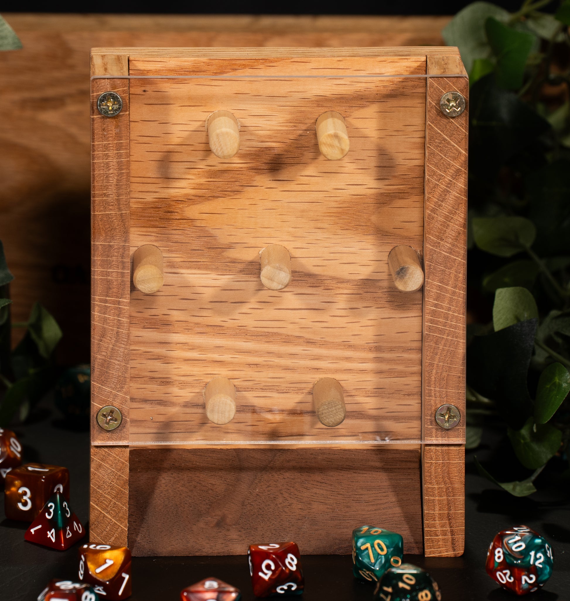 Red Oak Wooden Dice Tower. Plexi-glass front with a wooden back and wooden pegs throughout for the dice to fall against.