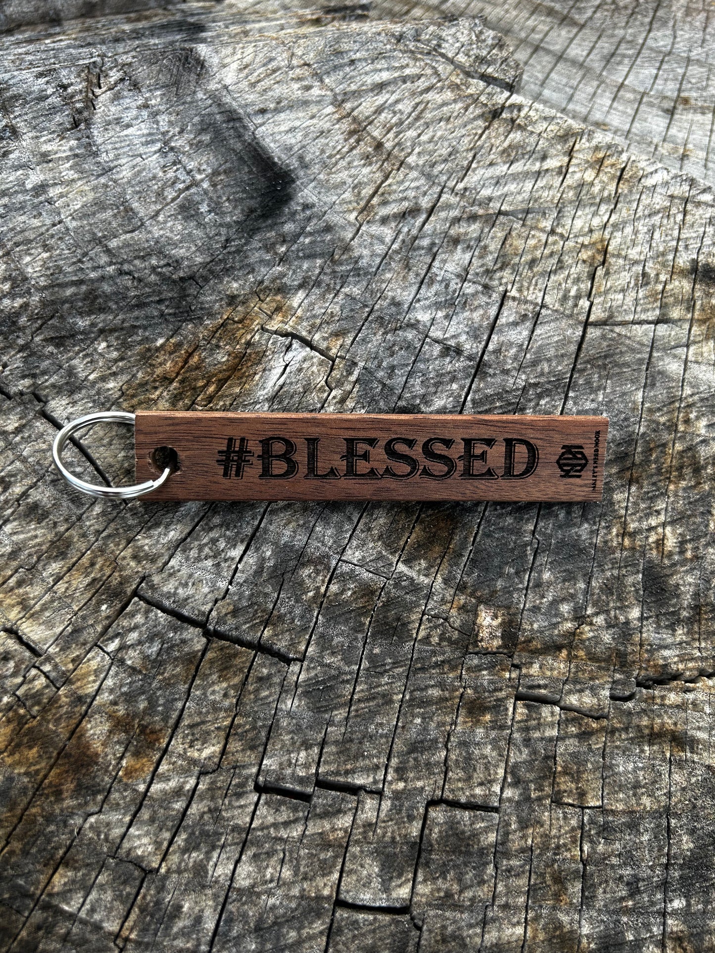 Willow Wooden Keychain with the word "#Blessed" and the Oakley Nerd Nook logo pressed into it