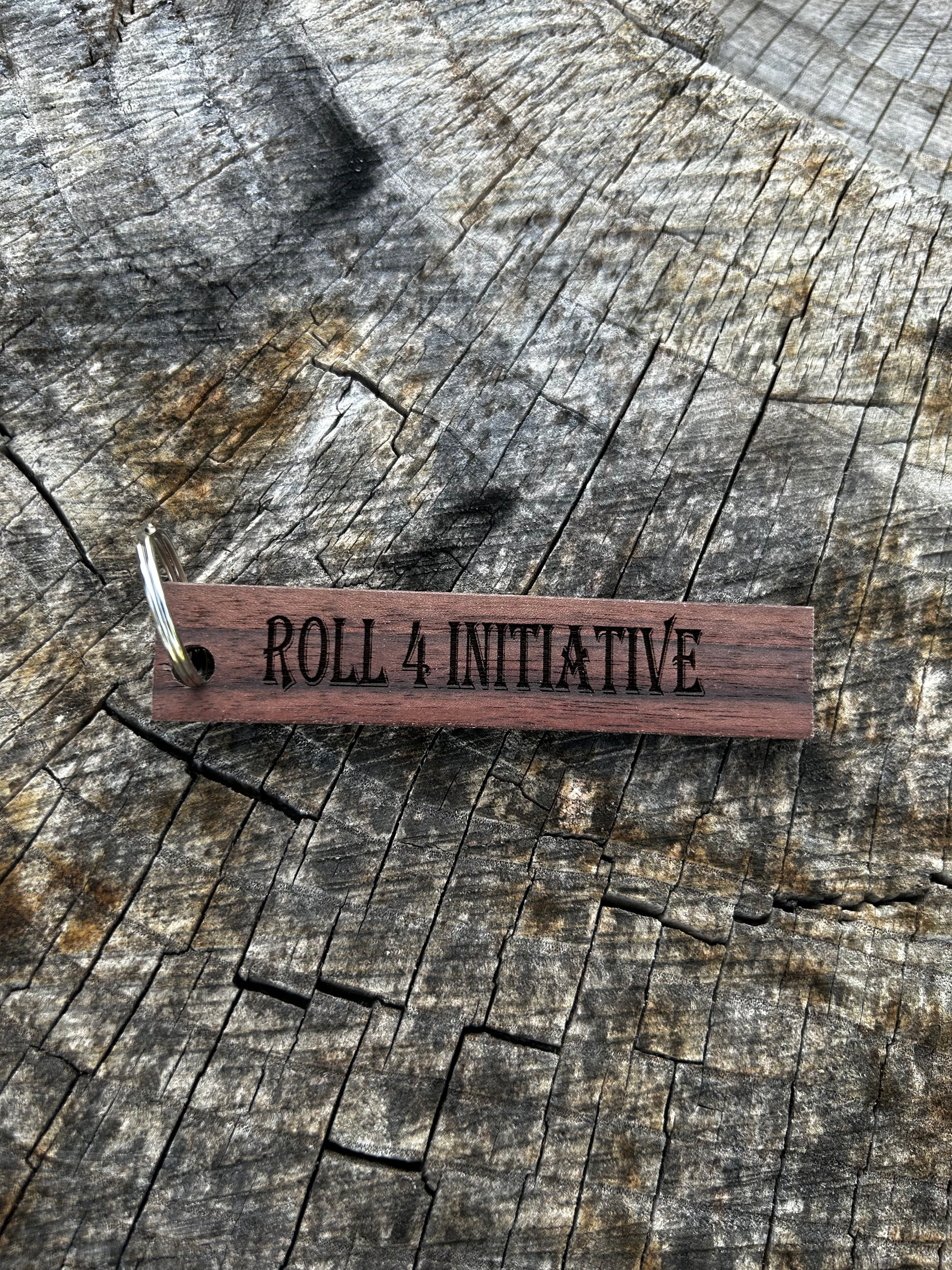 Willow Wooden Keychain with the word "Roll 4 Initiative" and the Oakley Nerd Nook logo pressed into it